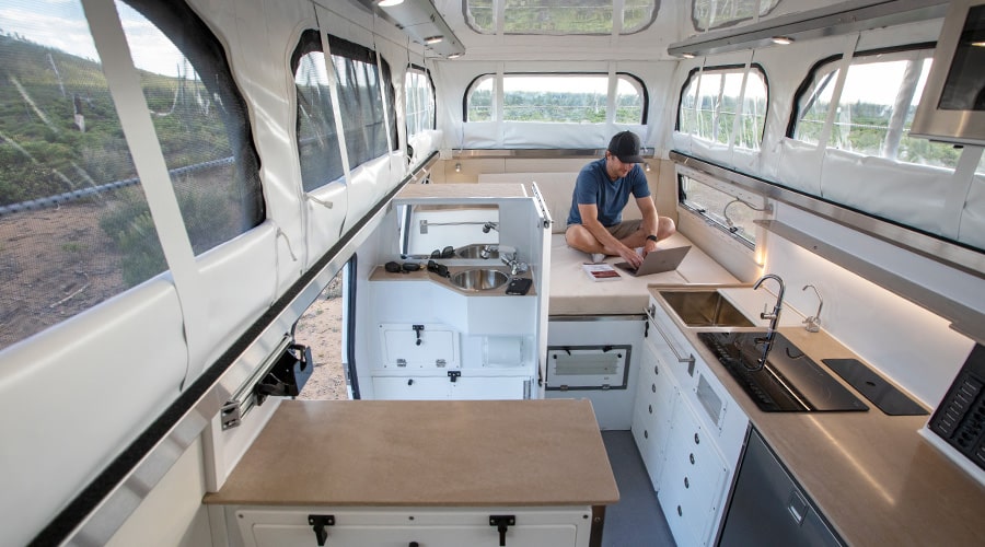 EarthCruiser EXP Interior bed and kitchen space liveability